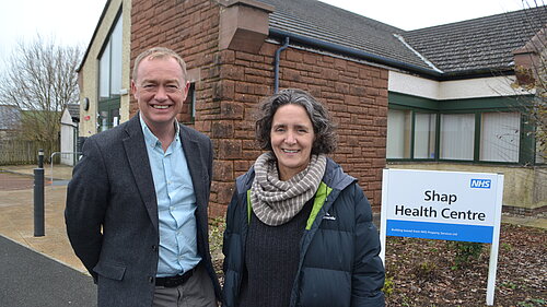 Tim outside Shap GP surgery with local councillor Nicki Vecqueray
