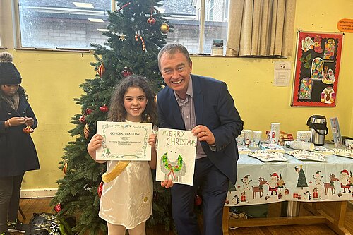 Tim with Christmas card competition winner Anna Kay