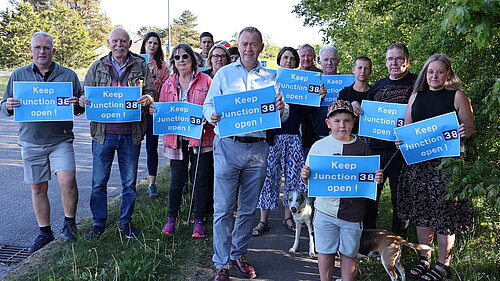 Tim with local residents at J38