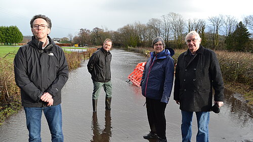 Tim and local councillors on Meathop Road