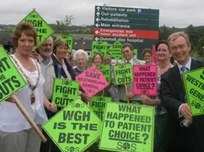 Tim and NHS SOS campaigners celebrate the cardiac unit victory