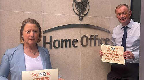 Libby and Tim outside the Home Office