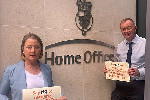 Libby and Tim outside the Home Office